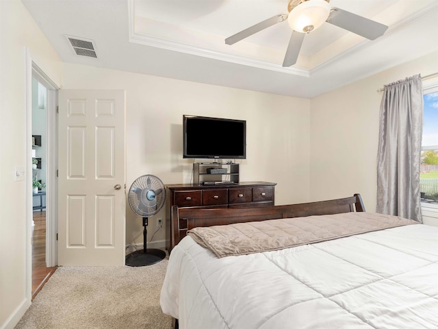 5326 Dennison Dr, Fort Wayne, IN 46835 - carpeted bedroom featuring visible vents, a ceiling fan, a raised ceiling, and baseboards
