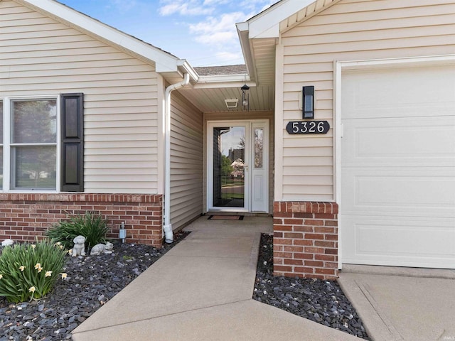 5326 Dennison Dr, Fort Wayne, IN 46835 - entrance to property with brick siding and a garage