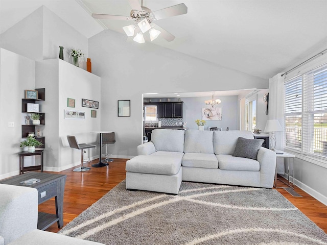 5326 Dennison Dr, Fort Wayne, IN 46835 - living room with baseboards, plenty of natural light, ceiling fan with notable chandelier, and wood finished floors