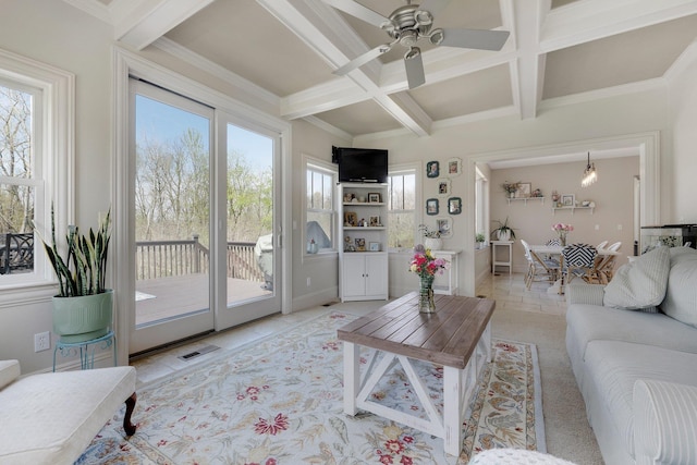 living room featuring a ceiling fan, visible vents, beam ceiling, ornamental molding, and coffered ceiling