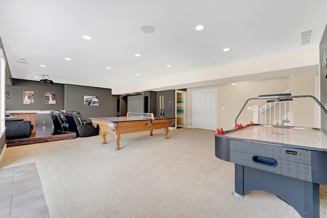 rec room featuring light colored carpet, recessed lighting, and visible vents