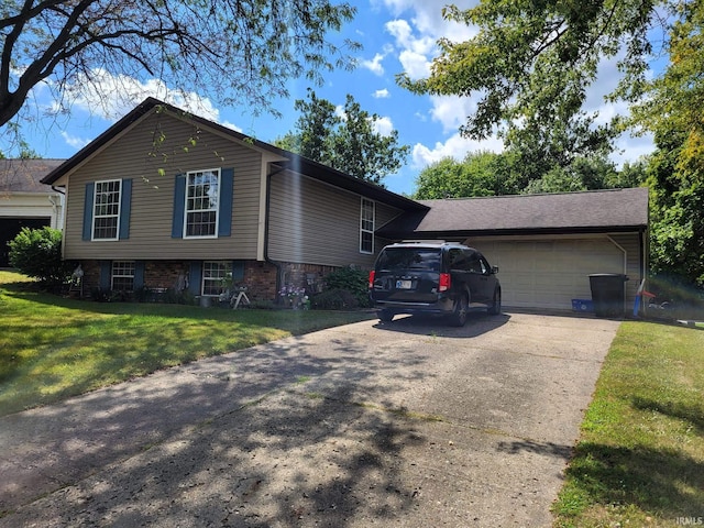 view of front of house with concrete driveway, brick siding, an attached garage, and a front yard