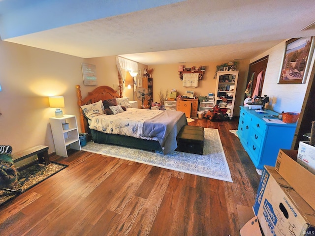 bedroom with wood finished floors