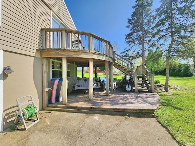 view of patio featuring a wooden deck and stairs