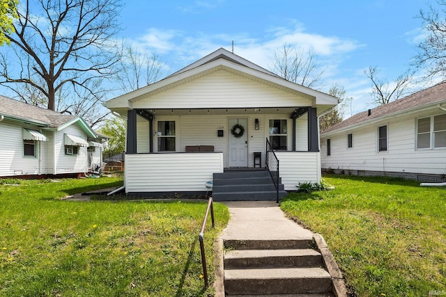 1314 Miner St, South Bend, IN 46617 - view of front of house with a porch and a front lawn
