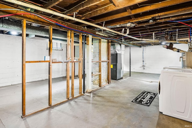 1314 Miner St, South Bend, IN 46617 - unfinished below grade area with washer / dryer, heating unit, and water heater