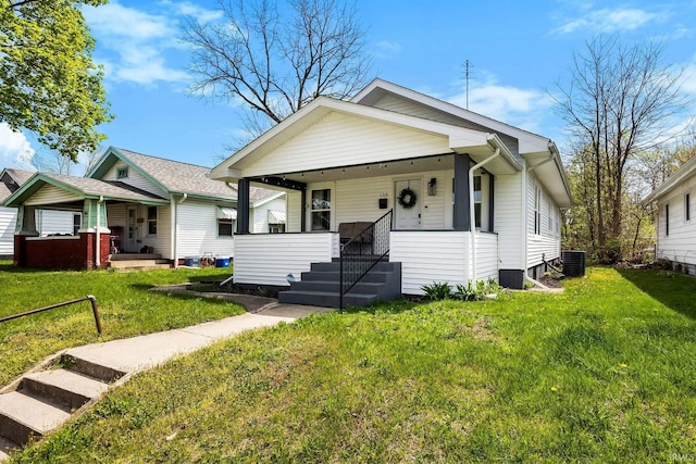 1314 Miner St, South Bend, IN 46617 - bungalow with a porch, central AC unit, and a front yard