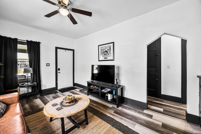 1314 Miner St, South Bend, IN 46617 - living room with baseboards, ceiling fan, and wood finished floors