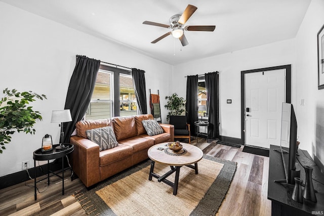 1314 Miner St, South Bend, IN 46617 - living room featuring baseboards, ceiling fan, and wood finished floors