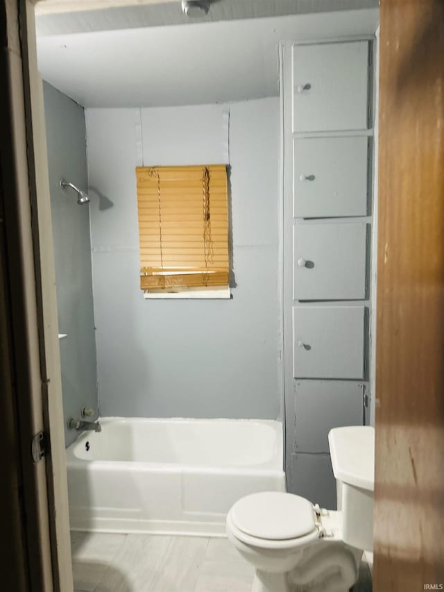 full bath with toilet and bathtub / shower combination
