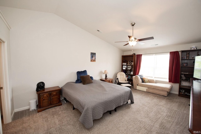 carpeted bedroom featuring visible vents, ceiling fan, and lofted ceiling
