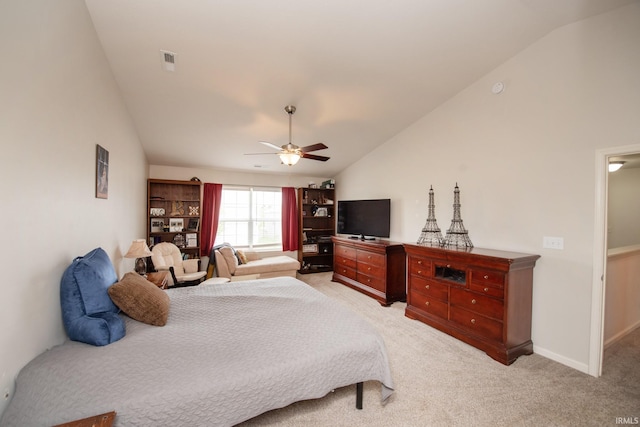 bedroom featuring a ceiling fan, light colored carpet, lofted ceiling, and visible vents