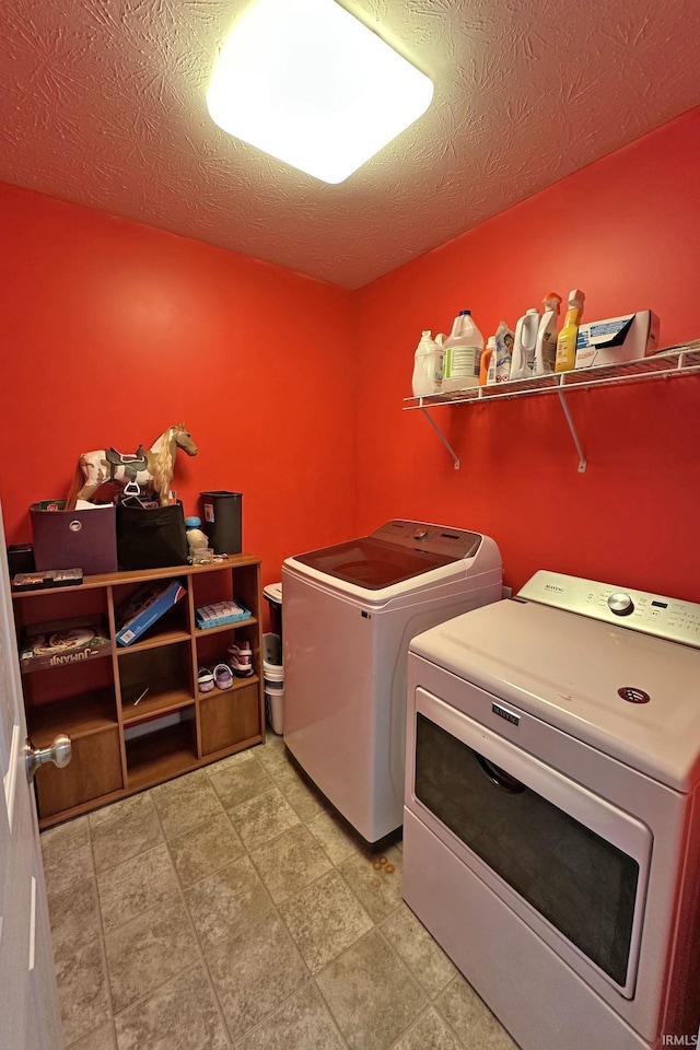 laundry room with laundry area and separate washer and dryer