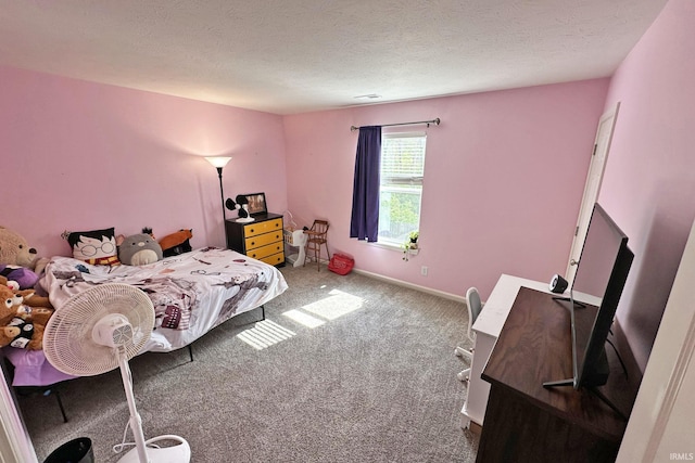 carpeted bedroom with a textured ceiling