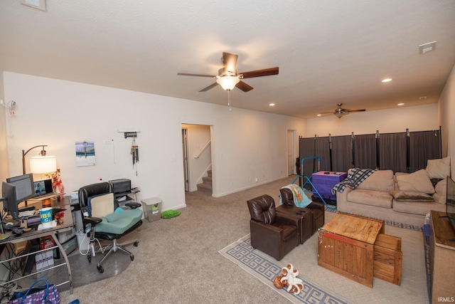 carpeted living area with recessed lighting, a ceiling fan, and stairway