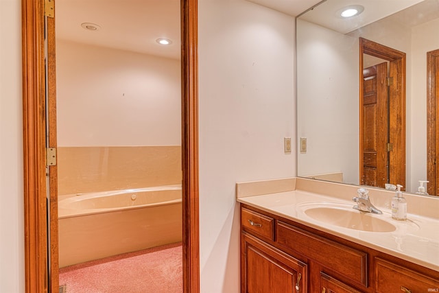 7001 Old Boonville Hwy, Evansville, IN 47715 - bathroom featuring recessed lighting, a bath, and vanity