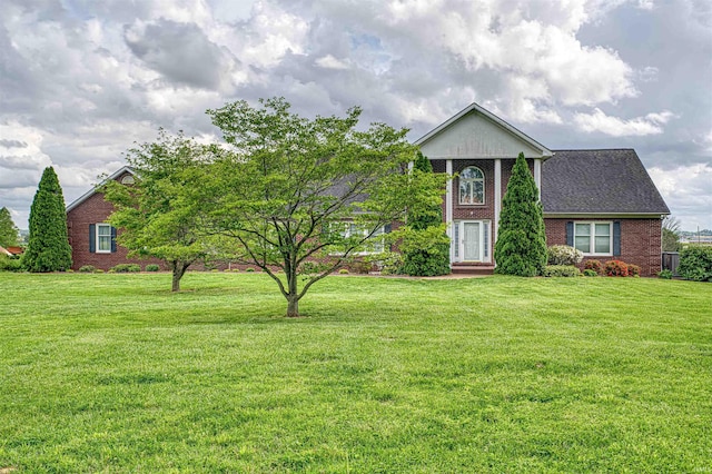 7001 Old Boonville Hwy, Evansville, IN 47715 - greek revival inspired property featuring brick siding and a front yard