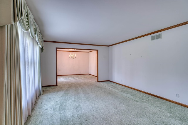 7001 Old Boonville Hwy, Evansville, IN 47715 - spare room featuring crown molding, visible vents, light carpet, and an inviting chandelier