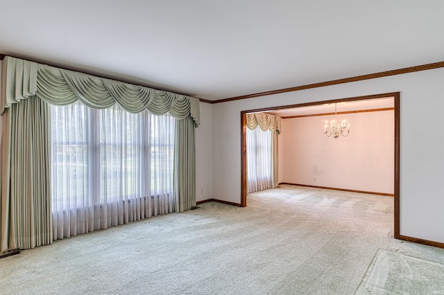 7001 Old Boonville Hwy, Evansville, IN 47715 - carpeted spare room with crown molding, baseboards, and a chandelier