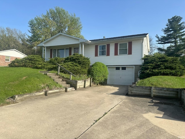 ranch-style house with driveway, a front lawn, and a garage