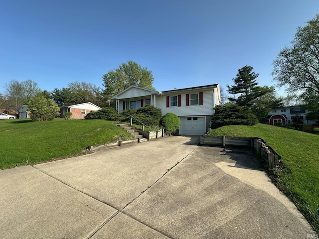 view of front of house with a garage, a front yard, and concrete driveway