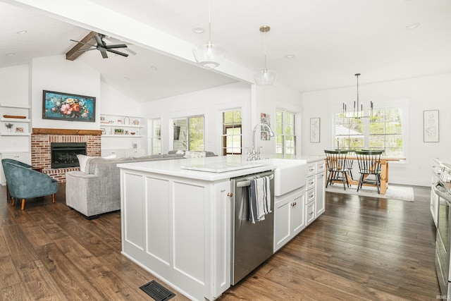 1284 E Zinnia Dr, Bloomington, IN 47401 - kitchen with stainless steel dishwasher, visible vents, white cabinetry, a sink, and dark wood finished floors