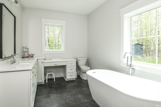 1284 E Zinnia Dr, Bloomington, IN 47401 - full bath featuring vanity, a freestanding bath, and toilet