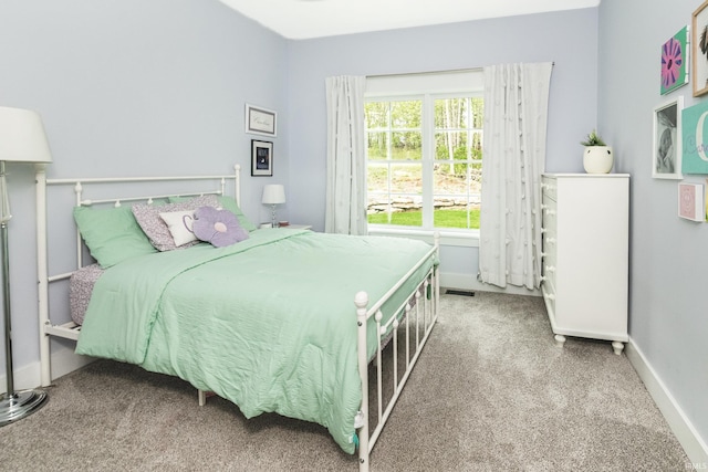 1284 E Zinnia Dr, Bloomington, IN 47401 - carpeted bedroom featuring baseboards and visible vents