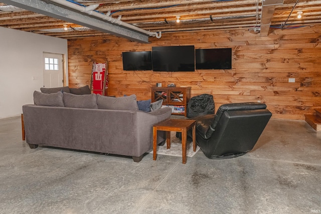 1284 E Zinnia Dr, Bloomington, IN 47401 - living room featuring wooden walls and concrete floors
