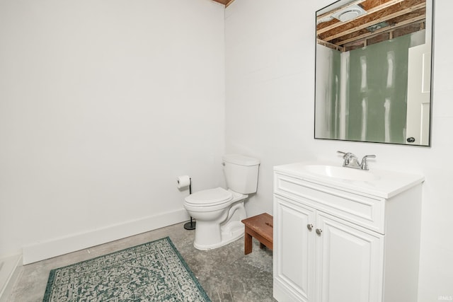 1284 E Zinnia Dr, Bloomington, IN 47401 - bathroom featuring vanity, baseboards, and toilet