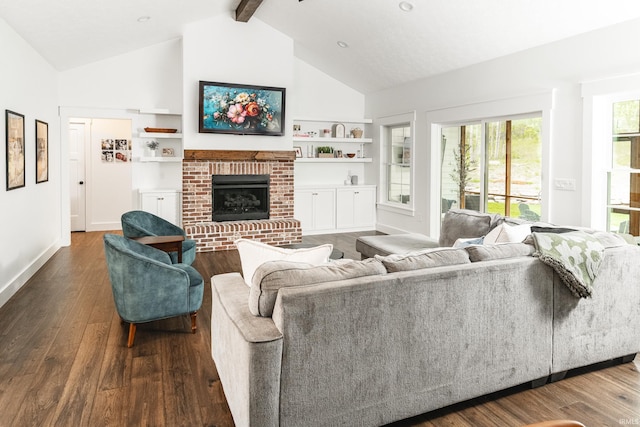 1284 E Zinnia Dr, Bloomington, IN 47401 - living room featuring dark wood-style flooring, a brick fireplace, high vaulted ceiling, built in shelves, and beamed ceiling