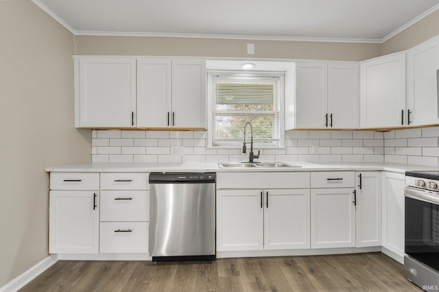 1743 Franklin Ave, Fort Wayne, IN 46808 - kitchen featuring crown molding, a sink, white cabinetry, and appliances with stainless steel finishes