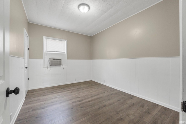 1743 Franklin Ave, Fort Wayne, IN 46808 - spare room featuring wood finished floors, a wainscoted wall, and cooling unit