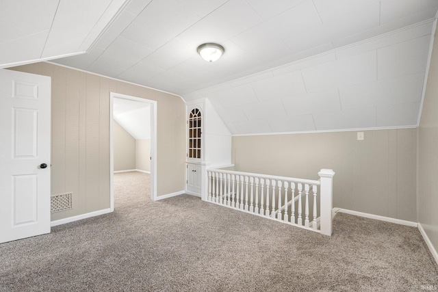1743 Franklin Ave, Fort Wayne, IN 46808 - additional living space with baseboards, carpet flooring, lofted ceiling, and visible vents