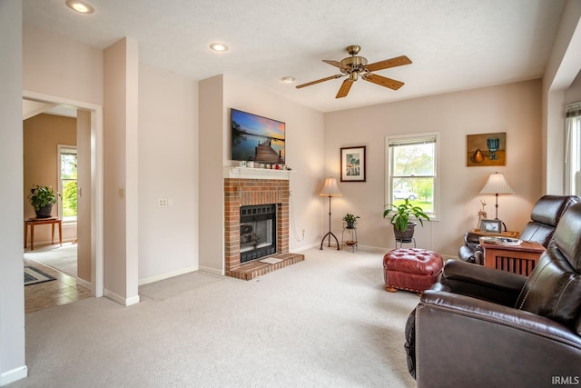 534 Lagrange St, West Lafayette, IN 47906 - carpeted living area featuring baseboards, a fireplace, a ceiling fan, and recessed lighting