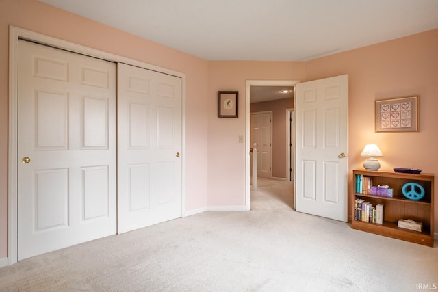 534 Lagrange St, West Lafayette, IN 47906 - bedroom featuring baseboards, light colored carpet, and a closet