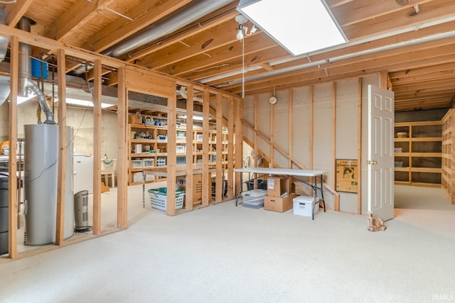 534 Lagrange St, West Lafayette, IN 47906 - unfinished basement featuring carpet and gas water heater