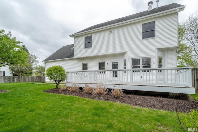534 Lagrange St, West Lafayette, IN 47906 - rear view of house with a lawn, fence, a wooden deck, and roof with shingles