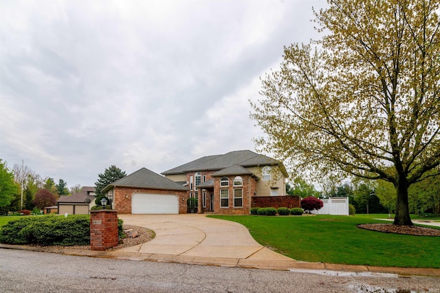 68106 Telegraph Ct, Lakeville, IN 46536 - view of front of home featuring a garage, a front lawn, fence, brick siding, and concrete driveway