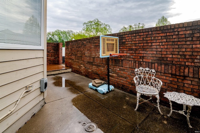 68106 Telegraph Ct, Lakeville, IN 46536 - view of patio / terrace featuring fence