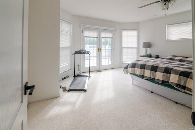 68106 Telegraph Ct, Lakeville, IN 46536 - bedroom featuring access to outside, french doors, ceiling fan, and visible vents