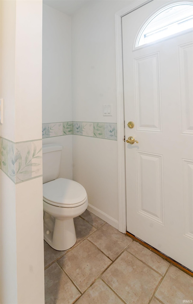 68106 Telegraph Ct, Lakeville, IN 46536 - bathroom with tile patterned flooring and toilet
