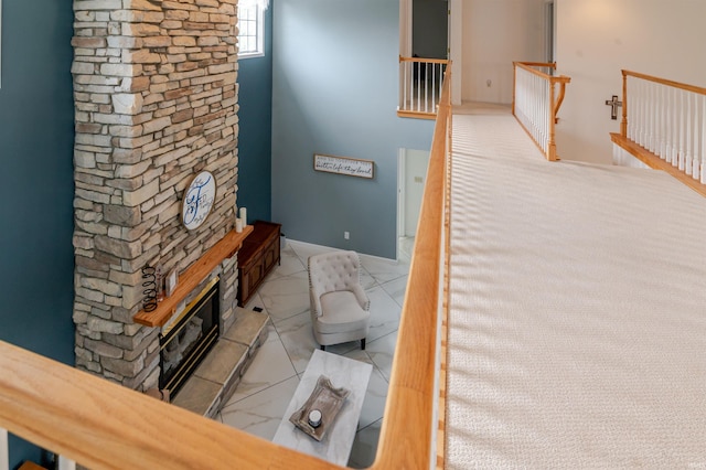 68106 Telegraph Ct, Lakeville, IN 46536 - stairway featuring a stone fireplace