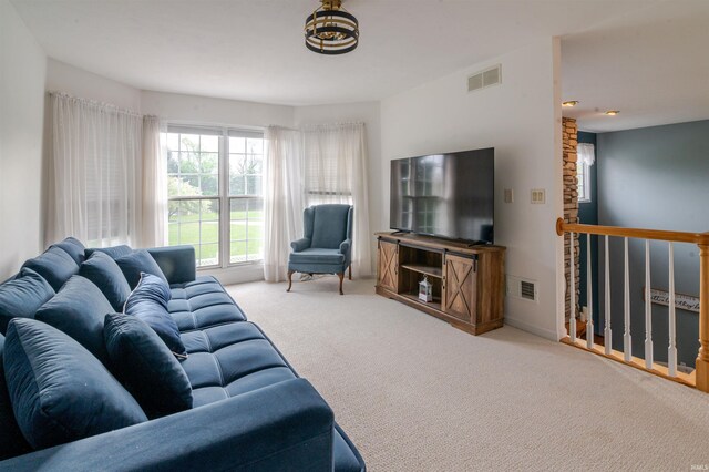 68106 Telegraph Ct, Lakeville, IN 46536 - living area featuring visible vents and carpet floors