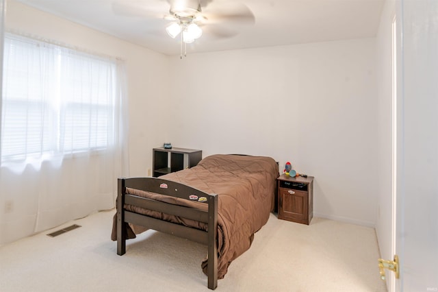 68106 Telegraph Ct, Lakeville, IN 46536 - carpeted bedroom with visible vents and ceiling fan