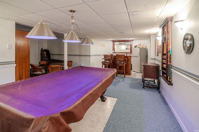 68106 Telegraph Ct, Lakeville, IN 46536 - playroom with carpet floors, baseboards, a drop ceiling, and bar