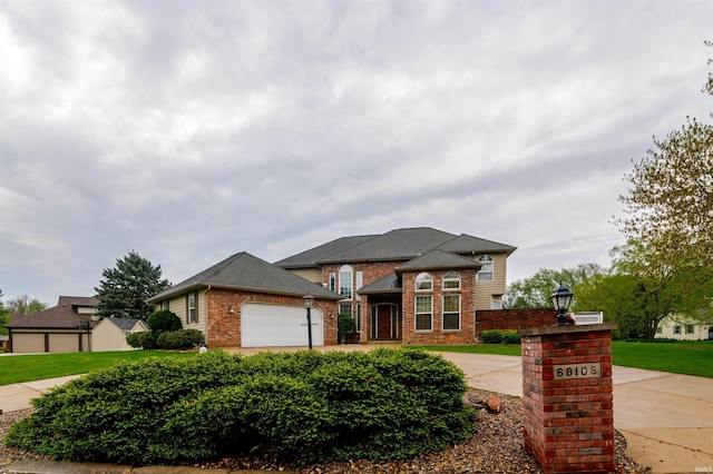 68106 Telegraph Ct, Lakeville, IN 46536 - prairie-style house featuring brick siding and a garage
