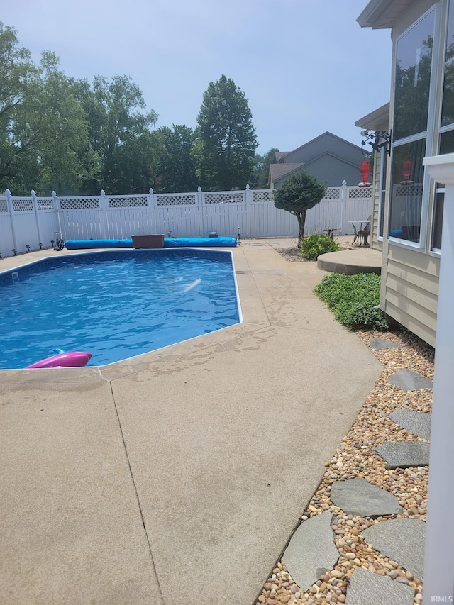 68106 Telegraph Ct, Lakeville, IN 46536 - view of pool with a fenced backyard, a fenced in pool, and a patio
