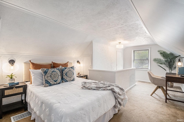 carpeted bedroom featuring baseboards, a textured ceiling, vaulted ceiling, and visible vents