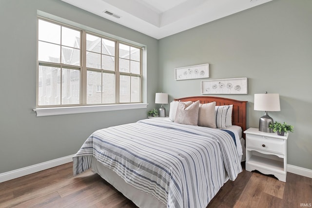 54637 Burdette St Unit 2, South Bend, IN 46637 - bedroom featuring visible vents, baseboards, and wood finished floors